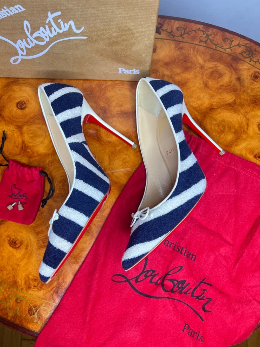 Christian Louboutin Navy and White Striped Pointed Toe Pumps with Red Soles